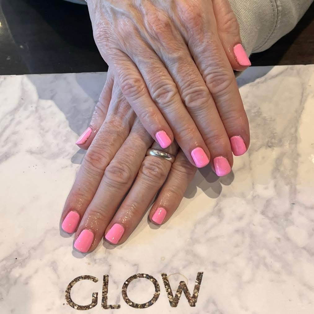 Pink french tip nails at Glow