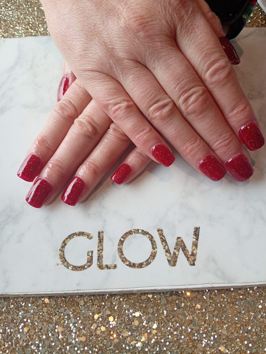 Navy glitter nails at Glow